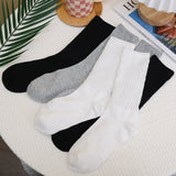 Sohiwoo Women Y2k Knitted Long Socks Girls Casual Black White Solid Loose Crochet Middle Tube Lolita Sox Cotton Boot Cuffs Ruffles Socks