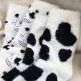 Sohiwoo 2Pairs Lovely Cow Pattern Fuzzy Crew Socks Milk Spotted Plush Thickened Soft Cute Comfortable Mid Tube Socks Warm Autumn Winter